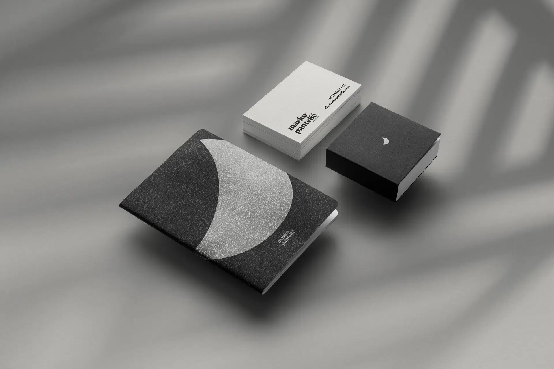 Brand identity for opera singer Marko Pantelić, combining classical typography, high contrast, and minimal design elements to reflect his dramatic stage presence and vocal power.