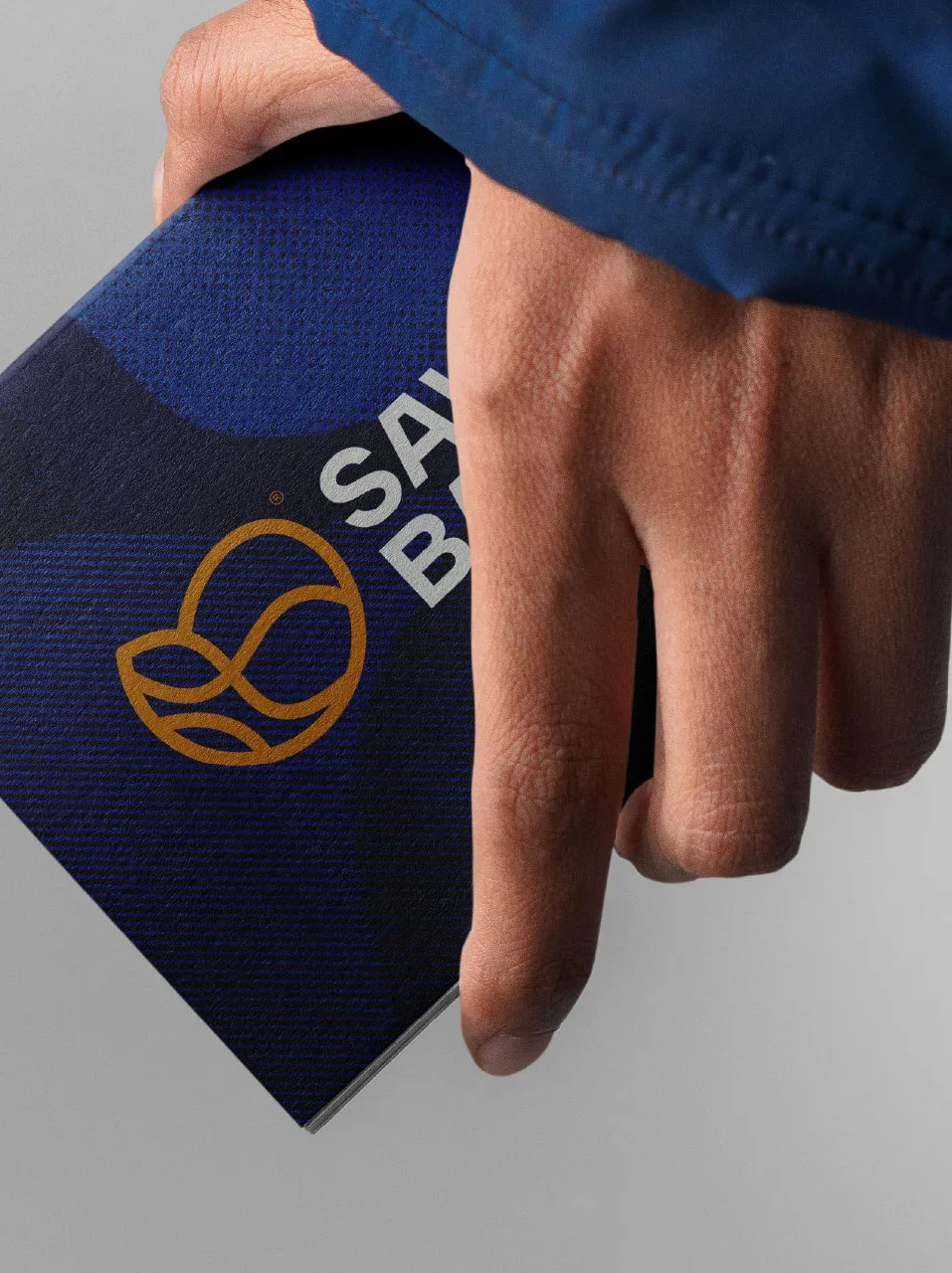 Savaball branding featuring a swirling monogram, deep yellow and midnight blue palette, and visual elements inspired by Viennese ball culture.