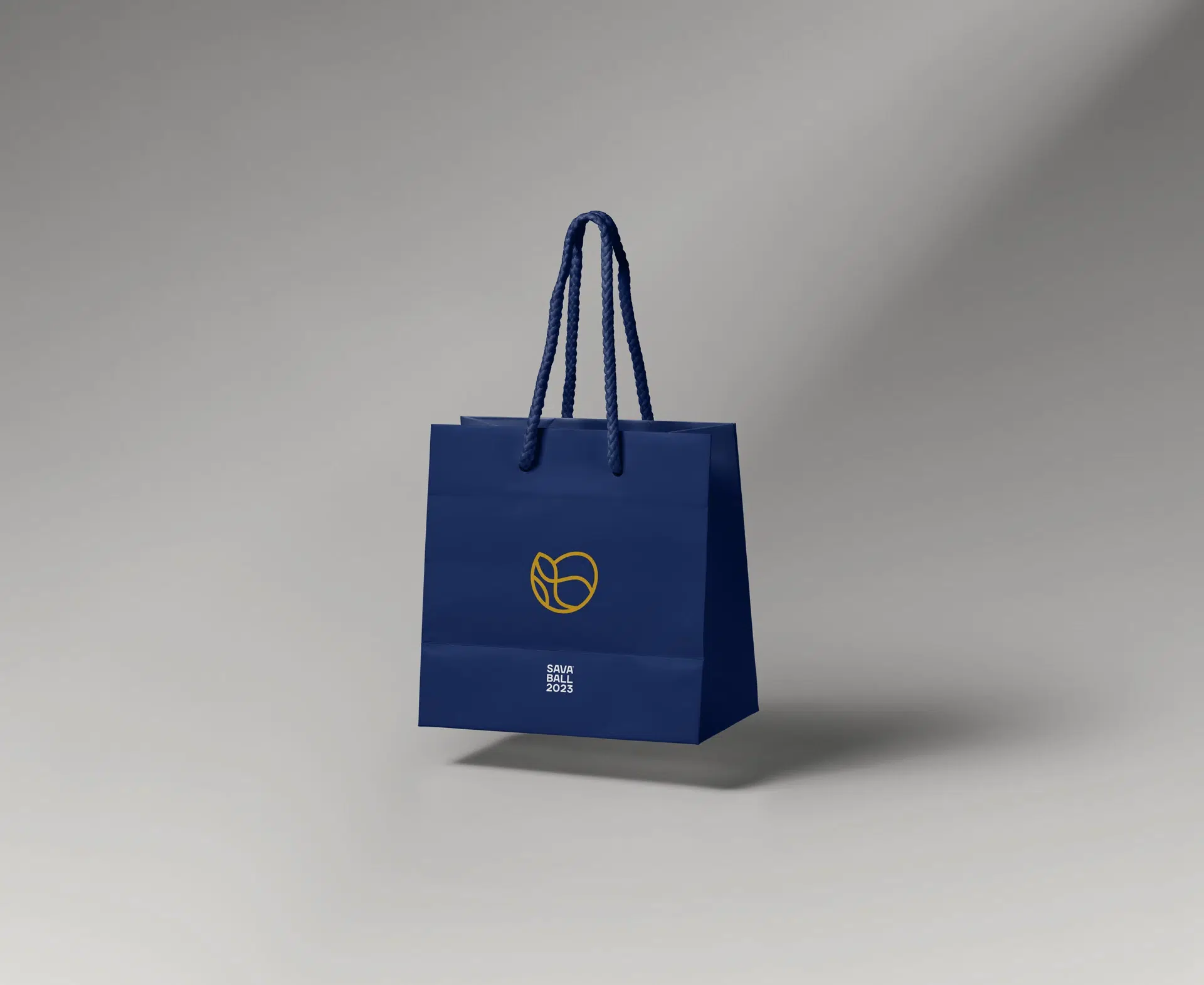 Visual identity for Savaball, featuring a swirling logo, elegant typography, and a rich palette of deep blue and yellow, reflecting Balkan culture in a Viennese ballroom setting.