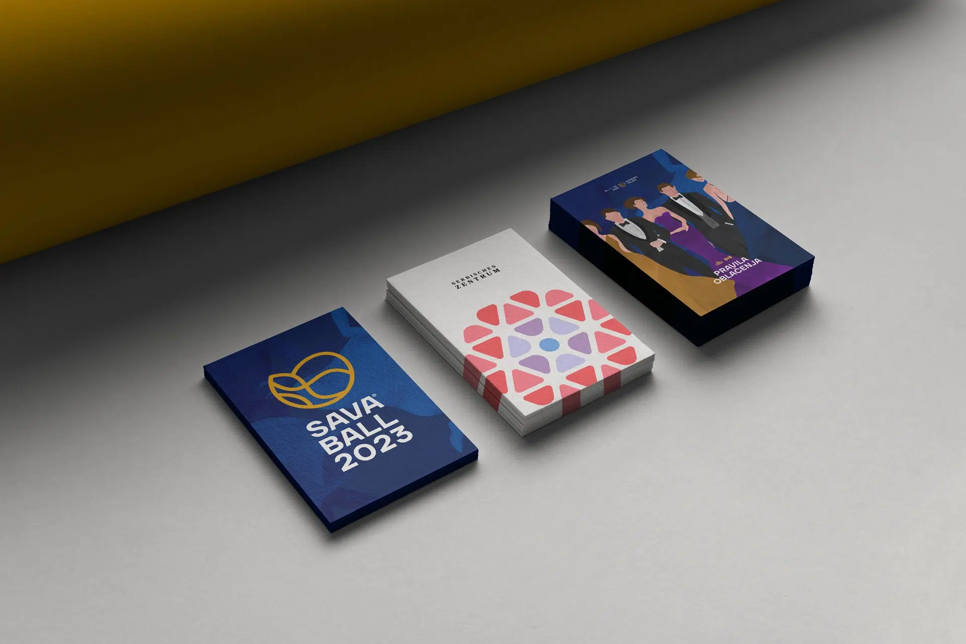Visual identity for Savaball, featuring a swirling logo, elegant typography, and a rich palette of deep blue and yellow, reflecting Balkan culture in a Viennese ballroom setting.